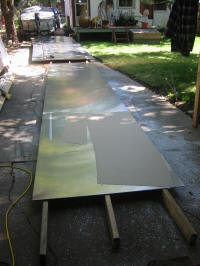 Laying out the pattern on the aluminum sheet.